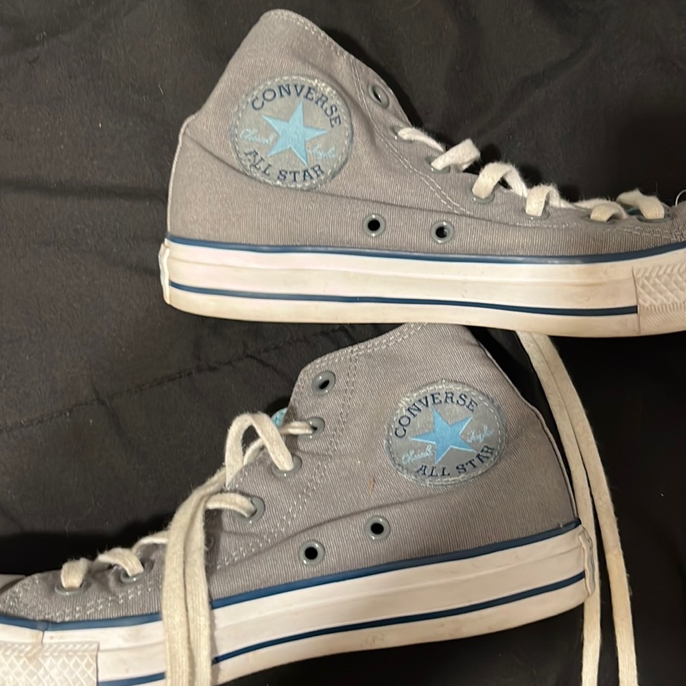 Grey and blue converse high tops
